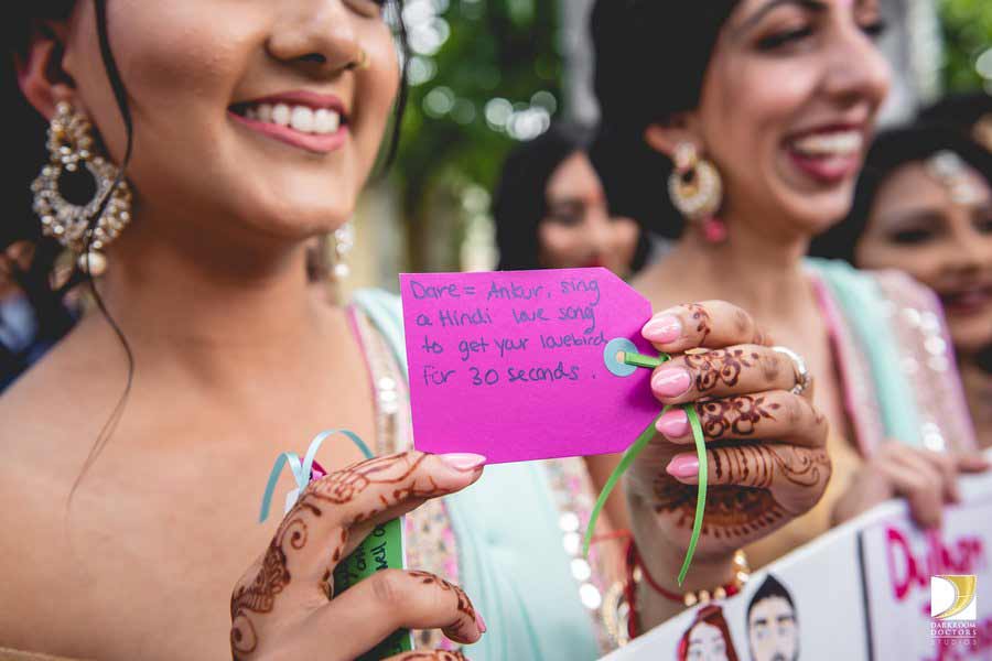 Tell the groom to enact the bride’s favourite song before he enters the venue