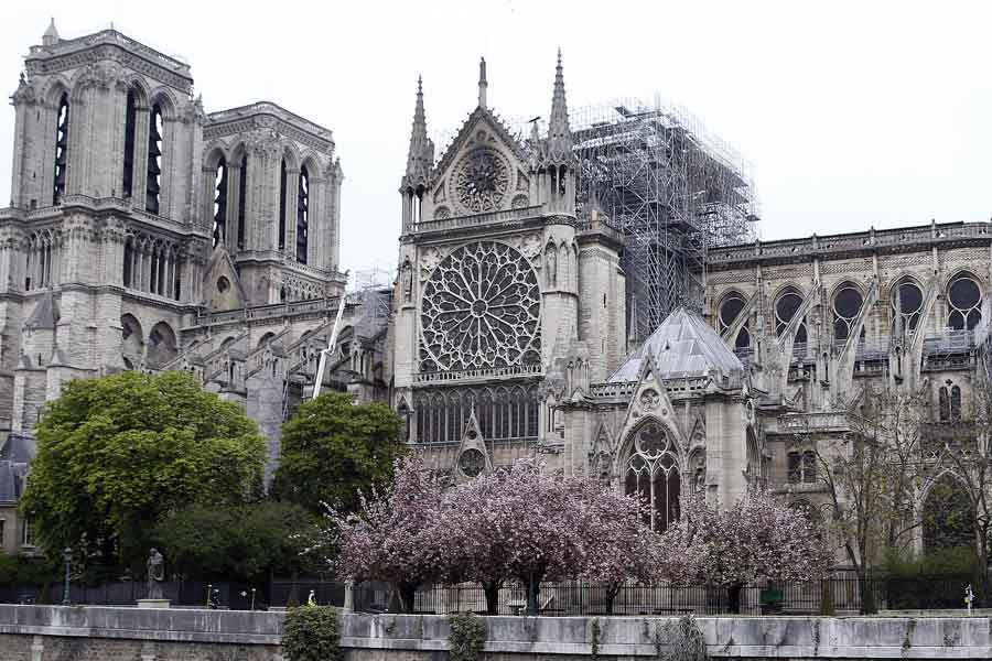 Relics of both the patron saints of Paris were located inside the spire